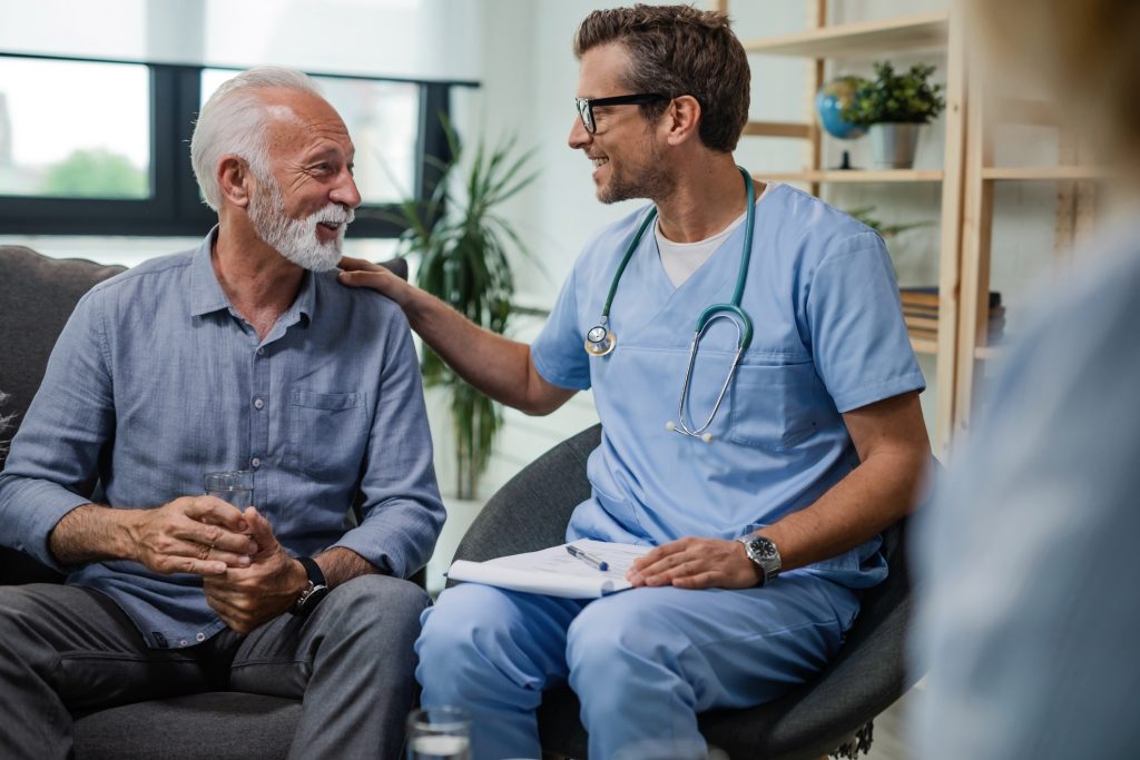 A healthcare professional providing psychological support to a patient.