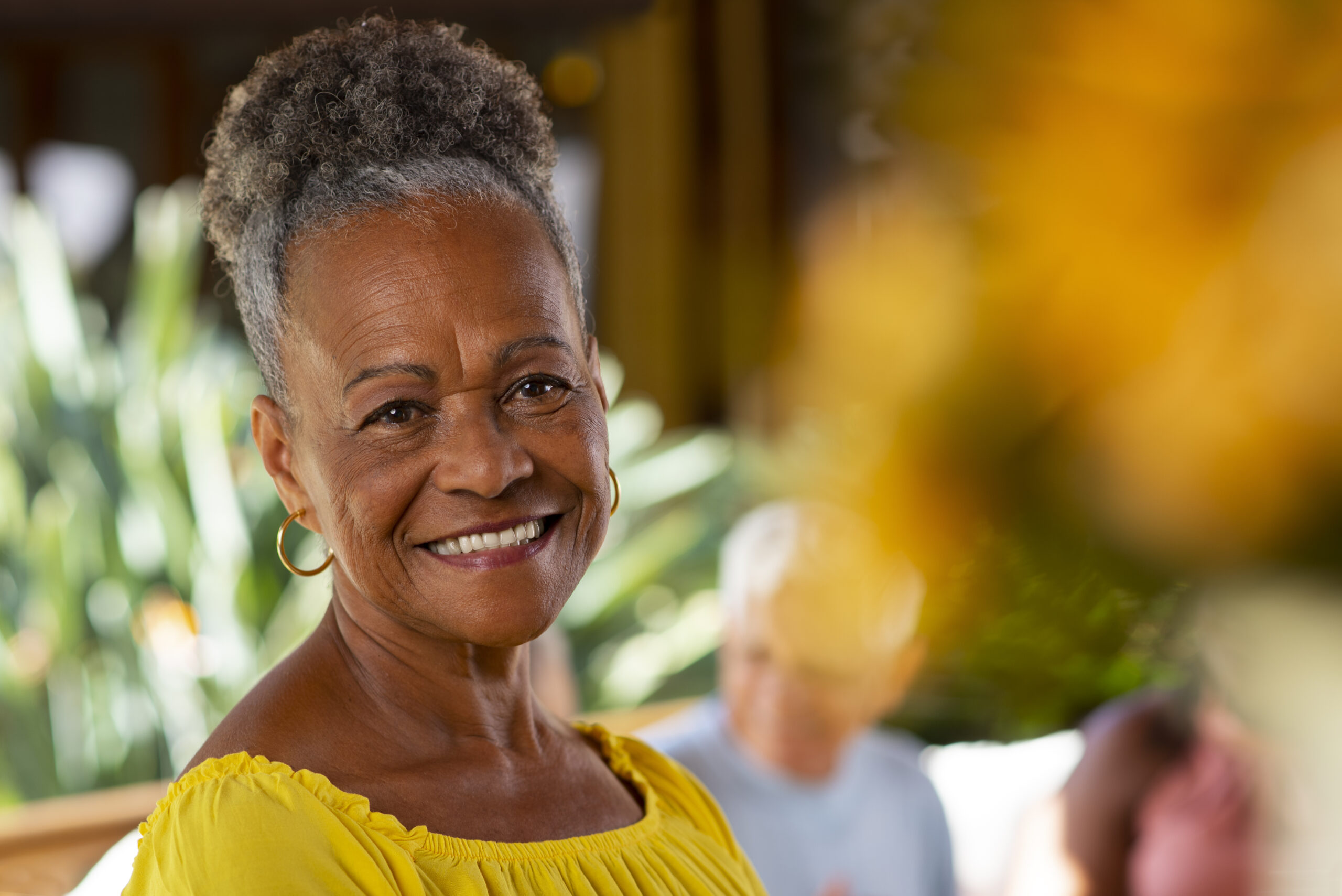 Senior woman smiling.